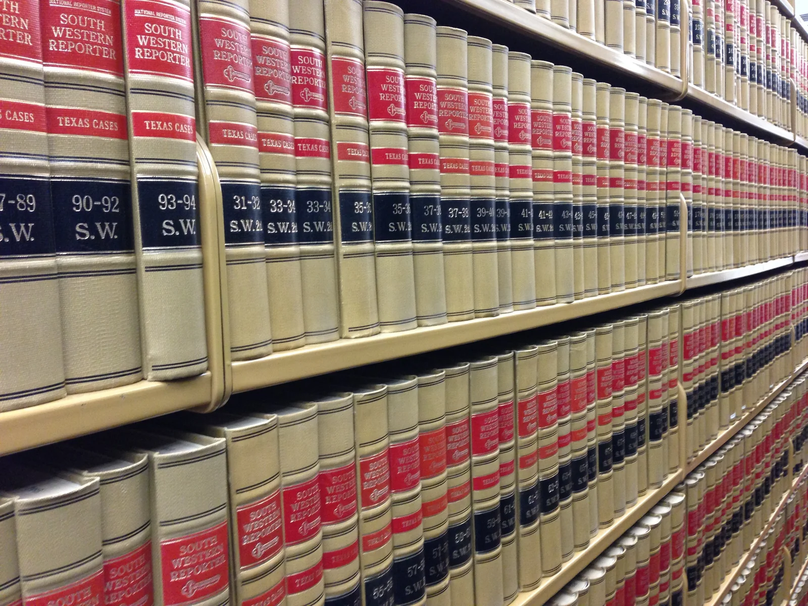 Shelves of bound legal reporters
